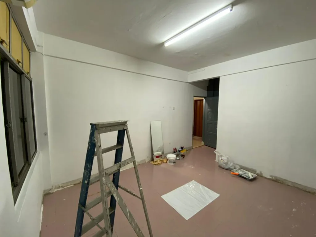 Twin bedroom during active painting works